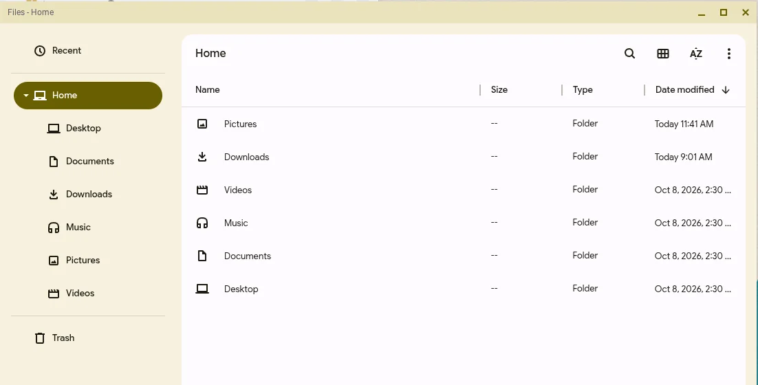 Files showing the Home folder with Desktop, Documents, Downloads, Music, Pictures and Videos, each with its own icon.
